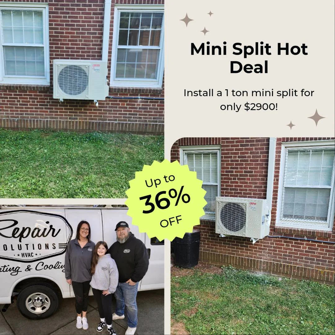 Outdoor mini split condenser unit mounted on brick home exterior with white trim windows
